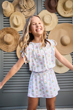 Load image into Gallery viewer, The Helen Dress in Blue Floral Block Print is a versatile wardrobe essential that grows with your tween. This bestselling Pleat design features adjustable shoulder ties that let her customize the fit, while a fully lined skirt ensures comfort and durability through every wear. The timeless floral block print pairs effortlessly with her existing pieces, making it perfect for school days, special occasions, and everything in between. 