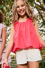 Load image into Gallery viewer, Girls Holly Top in Watermelon This gathered billowy tank from Pleat brings effortless spring style to any wardrobe. The vibrant watermelon hue pairs beautifully with the Girls Scottie Skirt for a polished, put-together look—or style it solo for playful versatility. The relaxed silhouette and airy fabric make it perfect for warm-weather days, whether she's heading to school, playdates, or family outings. 