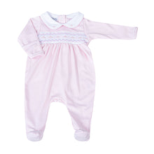 Load image into Gallery viewer, Experience unparalleled comfort for your little one with the Hazel and Hudson Smocked Collar Pink Footie from Magnolia Baby. This adorable footie features a soft pink color and a delicate white peter pan collar with lovely smocking across the chest adorned with sweet pink rosettes. Give your baby a cozy and stylish look today!