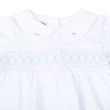 Load image into Gallery viewer, Clara's Classics Smocked Collared Tunic Set - the perfect outfit for your little one's wardrobe. This delicate white tunic features a beautiful smocked design and is paired with matching floral print leggings. From outings to special occasions, your little girl will look adorable and feel comfortable in this Magnolia Baby set.