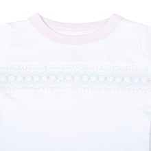 Load image into Gallery viewer, Introducing Clara's Classics Smocked Toddler Long Pajamas, the perfect bedtime attire for your little one. These pajamas are made by Magnolia Baby and feature beautiful Spring-colored smocking detail and a charming floral print on the pants. Comfortable and stylish, these pajamas will have your toddler sleeping soundly and looking adorable.