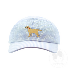 Load image into Gallery viewer, Keep your toddler stylish and comfortable with the Toddler Boys Dog Embroidered Seersucker Ball Cap from Wee Ones. Crafted from a breathable cotton/poly blend, this blue seersucker cap features a charming embroidered dog design that adds a playful touch. Ideal for playdates or family outings, it offers both sun protection and a fun way for your little one to express his personality. Durable and lightweight, this cap is a must-have accessory for any active toddler.