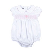 Load image into Gallery viewer, Wrap your little one in love and blessings with our Girls Pink Smocked Blessed Bubble. Made from soft, high-quality fabric, this bubble features delicate pink smocking and a beautiful cross detail, perfect for any special Baptism and religious occasion. With its classic peter pan collar, your little girl will look and feel blessed.