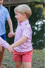 Load image into Gallery viewer, No matter the adventure, your boys will be ready in these fast-drying, UV-protective, boys' short-sleeve pro performance polo shirts in Pink Fishing Print. Our boys' polos keep moisture out with wicking technology, breathable fabric, and the signature vented back. PRODOH polo shirts are perfect for golf, tennis, country clubbing, or cruising the coast. 
UPF 50 95% Polyester 5% Lycra
100% Polyester Mesh Liner
Collar Interfacing for Structure
3 Button Placket/Extra Button Included
Vented Back