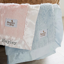 Load image into Gallery viewer, Softness and texture, everything your little snugglers are looking for! This sweet, cuddly blanket, with its nibble fur and satin binding, is perfect for cozy cuddles and comforting moments. Your little one will love snuggling up with this blanket, feeling the gentle touch of the softest fur and the silky satin. Whether it’s bedtime, movie night or just a quiet moment, this blanket is sure to bring comfort and joy. Let the snuggles begin!