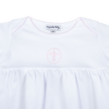 Load image into Gallery viewer, Welcome your little bundle of joy into the world with our Blessed Pink Smocked Gown. Crafted from the softest materials, this gown features a delicate cross stitched in the center of the chest and intricate embroidery on the neckline and sleeves. This simple yet elegant design is sure to become a cherished keepsake for years to come.
