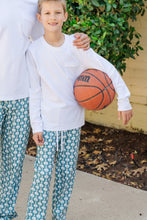 Load image into Gallery viewer, Keep your little athlete comfortable and stylish with the Beckett Boys' Lounge Pant from Lila & Hayes. Featuring a playful basketball print, these pants are perfect for game days or relaxed playtime. Designed with soft, cozy fabric, they offer ease of movement and all-day comfort, making them a winning choice for your active boy’s wardrobe.