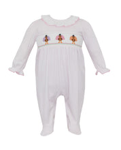 Load image into Gallery viewer, Petit Bebe’s Pink Knit Striped Turkey Smocked Long Romper brings warmth and charm to every Thanksgiving moment. Crafted with cozy knit fabric and delicate turkey smocking, it wraps your little one in comfort and festive spirit, whether with footies for infants or an easy fit for older babies!
Footie - 3m, 6m
Footless Romper - 9m, 12m, 18m, 24m