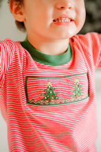 Load image into Gallery viewer, Pre-Order
Celebrate the holiday season in style with the Boy's Christmas Tree Smocked Tee & Pant Set from Zuccini Kids. This charming set includes a striped knit tee featuring a delicate smocked Christmas tree detail, paired perfectly with cozy green knit pants. Comfortable and festive, it’s ideal for your little one’s holiday gatherings and family photos, combining seasonal cheer with everyday wearability.