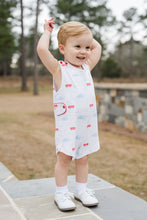 Load image into Gallery viewer, This charming Infant Boy's Puppy Dog Tails Reed Jon Jon from James & Lottie features an irresistible blue, white, and red puppy and wagon print that will captivate everyone's attention. Crafted from comfortable knit fabric, this adorable outfit is perfect for your little puppy enthusiast. Make summer memories even more special with this eye-catching Jon Jon that combines playful style with classic appeal. A must-have addition to your little one's wardrobe!