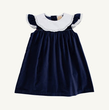 Load image into Gallery viewer, The Beaufort Bonnet Company’s beloved Franny Frock in charming Nantucket Navy with Worth Avenue White and Covington Cottage Plaid is a must-have for every little girl's wardrobe. This adorable girls' dress features a sweet plaid patterned bow that's perfect for tea parties, portraits, and special occasions. It's a timeless piece that brings Southern charm to every wardrobe!