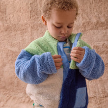 Load image into Gallery viewer, Magnetic Me’s Blue Colorblock Sherpa Boys Magnetic Jacket is designed with magnetic closures that fasten in a flash. For warmth without the bulk, it’s made from fluffy sherpa fleece and is lined with soft organic cotton. A roomy hood and front pockets keep little ones adorably, comfortably toasty.