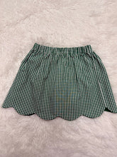 Load image into Gallery viewer, Celebrate the season in style with the Girls Kendall Christmas Tree Corduroy Skirt from Zuccini Kids. Crafted from soft, durable corduroy, this skirt offers both comfort and festive charm. Its adorable Christmas tree design adds a playful holiday touch perfect for family gatherings or seasonal parties. Pair with the coordinating Scalloped Collar Blouse.