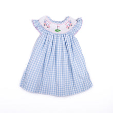 Load image into Gallery viewer, Girls Golf Smocked Bishop Dress- Introduce her to the fairway in style with this charming dress from Shop Teeta. Featuring a delicate smocked bishop neckline adorned with pink golf-themed embroidery, this piece pairs timeless blue and white gingham with graceful flutter sleeves for an effortlessly polished look. 