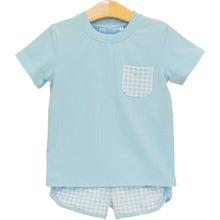 Load image into Gallery viewer, Experience the joy of sunny days with the Madden Short Set in Light Blue Gingham by Trotter Street Kids! This delightful ensemble features a soft knit tee with a charming gingham pocket, complemented by matching shorts. Designed for comfort and breathability, it's perfect for your little one’s spring and summer adventures!