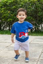Load image into Gallery viewer, Ignite your child's imagination with the Firetruck Knit Tee by Zuccini Kids! This royal blue shirt features a charming firetruck design that’s sure to delight. Made from breathable fabric, it keeps them comfortable during playtime. Let your little one drive their adventures in style and comfort! Shorts not included.