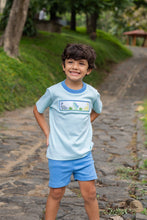 Load image into Gallery viewer, Unleash your little one's adventurous spirit with the Dinosaur Mint Harry’s Play Tee! This vibrant mint-striped knit tee, adorned with playful dinosaur smocking, offers ultimate comfort and breathability, perfect for energetic toddlers. Dress them in style, and watch their imagination roar! Shorts not included.