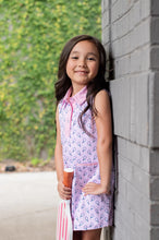 Load image into Gallery viewer, Serve up style with the Girls’ Sleeveless Performance Dress in Pink Frosting Pickleball— UPF 50+ Performance Knit. Soft, breathable, moisture-wicking fabric keeps her comfortable from the court to the clubhouse, while UPF 50+ protection helps block 98% of harmful rays. A polished polo collar, 3-button placket, and sleeveless design make this dress a match for active days. Complete with our back-neck "Get Back Here Loop" and neatly finished armholes for lasting comfort.