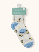 Load image into Gallery viewer, Mom and Baby can have cozy and coordinating feet with the Mama & Me Socks Set from JuJuBe × Studio Oh! Made of polyester and spandex for ultra-comfort, these cute and colorful matching socks are perfect for photos, lounging around the house, and making a “twinning” fashion statement on the go. The socks feature irresistible, on-trend designs that make a stylish addition to any mama-and-baby ensemble. The baby socks are for babies 3 to 12 months, and adult socks are one-size-fits-most.
