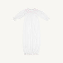 Load image into Gallery viewer, Welcome your newest blessing in The Beaufort Bonnet Company’s Sweetly Smocked Greeting Gown in Worth Avenue White with Palm Beach Pink, featuring smocked details and delicate sleeve accents that make every moment magical. This convertible gown offers the convenience of an elastic bottom for easy diaper changes while keeping baby cozy and comfortable. Ideal for those precious first days at home, hospital photos or gifting to expecting parents.