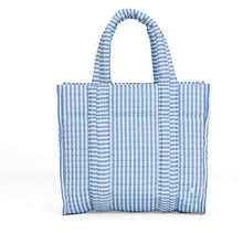 Load image into Gallery viewer, TRVL Design’s Go Go Tote is the perfect size to hold all of your belongings. You can use it as your everyday bag, beach bag, diaper bag, a carry on, or an overnight bag. It comes with exterior gusset pockets, drop collar zip closure, interior pockets and is wipeable inside and out or machine washable.