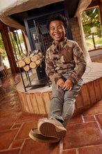 Load image into Gallery viewer, When the temperature drops, Finn’s Camouflage Sherpa Snap Jacket delivers warm, lightweight comfort for everyday adventure. Ultra-soft high-pile sherpa fleece provides breathable insulation without feeling bulky, while the snap-placket collar, woven zippered chest pocket, and elastic-bound cuffs and hem give it a practical, polished finish for crisp mornings and campfire evenings.