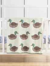 Load image into Gallery viewer, Wrap your newborn baby in cozy comfort with Mud Pie’s Mallard Chenille Blanket, crafted from ultra-soft chenille knit for a plush, inviting feel. Made from 100% polyester, this blanket is warm, durable, and easy to care for, making it perfect for a sweet addition to a nursery. Its rich texture and comfortable design make it an ideal everyday blanket your precious newborn. Size: 34x28