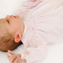Load image into Gallery viewer, Sweet, classic, and made for everyday comfort, the Magnolia Baby Anna Bishop Footie - Pink is a timeless essential for your little one. Crafted from 100% Peruvian Pima cotton, it offers exceptional softness and breathability for delicate skin.