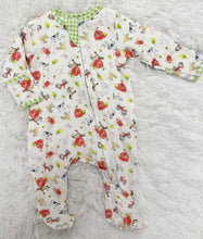 Load image into Gallery viewer, Wrap your little one in comfort and charm with the Barnyard Babies Zipper Footie from Magnolia Baby. Made from soft, breathable pima cotton, these footies provide gentle warmth and cozy softness for delicate skin. The playful farm animal and barn print adds a sweet touch, making it a delightful choice for your precious baby. Easy to put on and take off with the handy zipper, this footie combines practicality with adorable style to keep your smallest love snug all day and night.