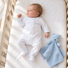 Load image into Gallery viewer, Celebrate the special bond between siblings with Magnolia Baby’s Little Brother Embroidered Footie. Crafted from luxurious Pima Cotton, this footie offers unparalleled softness and comfort for your little one. The design features an embroidered "little brother" in a gentle light blue, highlighting his special role.