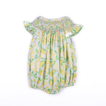 Load image into Gallery viewer, Brighten her wardrobe with the Infant Girls Lemon Hallie Bubble from Shop Teeta. This charming piece features a delicate smocked neckline and a vibrant lemon print that captures playful summer style. The classic bubble silhouette offers comfortable, easy movement—perfect for active little ones. Soft and versatile, it pairs beautifully with basics for everyday wear or dressed up for special occasions. A timeless addition to any infant girl's closet.