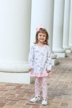 Load image into Gallery viewer, Dress your little one in the enchanting Once Upon a Time Pants Set from Trotter Street Kids. This charming outfit features a fairy tale print tunic with a delicate ruffle hem, paired perfectly with soft pink leggings for all-day comfort. Ideal for playdates or special occasions, this set combines whimsical style with cozy wearability, making it a must-have addition to your child’s wardrobe.