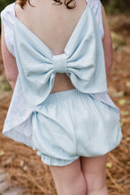 Load image into Gallery viewer, Elevate your little one's style with the Put a Bow on it Bloomer Set from James & Lottie. This charming set features a white and blue bow design, with an adorable oversized bow accent on the back, for a sweet and playful touch. Perfect for any occasion, this set will turn heads and spark conversations.