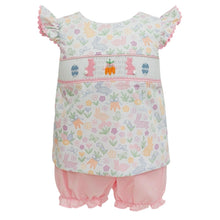 Load image into Gallery viewer, Get ready for Easter Sunday with our Smocked Bunny Garden Swing Back Bloomer Set! This adorable outfit, designed for infant and toddler girls, features a floral and bunny print top with a smocked bodice, embroidered bunnies, and adorable tie back with big pink bow. Paired with coordinating pink bloomers, this set is perfect for your little one to hop into spring with style. 