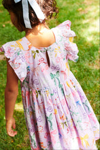 Load image into Gallery viewer, Effortlessly chic and stunning, our Girls Elsie Dress in Lavender Watercolor Bows from Pink Chicken will make your little one stand out in any crowd. The delicate flutter sleeves and charming mix of bows add a touch of elegance to the playful a-line silhouette. Perfect for any occasion, this dress will be a favorite in her wardrobe.
