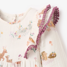 Load image into Gallery viewer, Wrap your little one in whimsical woodland charm with the Infant Girl's Organic Muslin Forest Family Printed Ruffle Jumpsuit. Featuring sweet woodland characters and delicate ruffle details, this soft, breathable jumpsuit is perfect for cozy playtime and outings. Ideal for adding a touch of nature-inspired magic to your baby's wardrobe.