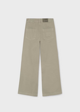 Load image into Gallery viewer, Effortless style meets everyday comfort in these girl wide leg pants from Mayoral. Cut in a warm tan hue, they're designed for the modern tween who values both trend-forward silhouettes and timeless appeal. The relaxed, wide-leg fit offers freedom of movement while maintaining a polished, put-together look—ideal for layering through fall. 