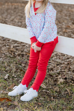 Load image into Gallery viewer, Girls Full Bloom Red Scallop Leggings are a must-have for her wardrobe, offering both comfort and style. Their vibrant red scalloped design adds a playful touch that pairs beautifully with the Full Bloom Sweatshirt for a cozy, fashionable fall outfit. Perfect for everyday wear, these leggings bring both practicality and charm to her seasonal looks.