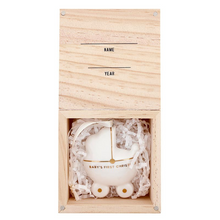 Load image into Gallery viewer, Celebrate your little buddle of joy's first Christmas with this charming ceramic baby carriage ornament. A sweet keepsake for new parents, it comes nestled in a wooden box
Features gold metallic accents
Includes ribbon for easy hanging
Packaged in a wooden box for simple gifting and storage
Personalize the box with baby's name and birth year