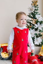 Load image into Gallery viewer, Dress your little one in festive charm with the Christmas Tree Ashton Corduroy Longall from Zuccini Kids. Made from soft red corduroy, this longall is embroidered with charming Christmas trees, creating a classic holiday look. Perfect for sibling coordinating outfits, it pairs beautifully with a Peter Pan collar shirt for an extra touch of timeless style. Celebrate the season in comfort and joy with this adorable holiday staple.