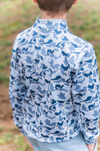 Load image into Gallery viewer, The Boys Pro Performance Blue Camo Pullover by Prodoh combines style and function with its bold blue camo print and durable performance fabric. Designed for toddlers to tween boys, this 1/4 zip pullover offers easy layering and exceptional comfort during active play. Perfect for year-round wear, it helps keep your young one warm without overheating, making it an essential addition to any kid’s wardrobe.