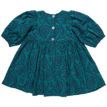 Load image into Gallery viewer, Collection Classic! Whether covered in a field of Fall flowers or a swirling embroidered floral, our classically tailored Girls Brooke Dress is ready for anything and everything this season. Signature details include a rounded neck, twirl worthy full skirt, gathered puff sleeve and glitter buttons at the back. Available in this Fall's fabulous patterns, Evergreen with Navy Embroidery, Inca Gold with White Embroidery and our shimmery Autumn Flowers.