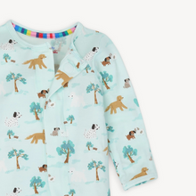 Load image into Gallery viewer, The Central Bark Zipper Footie is a must-have for everyday wear and nighttime comfort. Featuring quick, quiet magnetic closures, it makes dressing and middle-of-the-night changes effortless. Crafted from eco-friendly TENCEL™ modal, this footie is silky soft, breathable, and gentle on sensitive skin. Its temperature-regulating fabric keeps your little one warm in winter, cool in summer, and comfortable all year long. Experience convenience and cozy softness in one perfect piece.