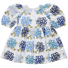 Load image into Gallery viewer, Nice Threads! A patchwork of richly hued blue blossoms are embroidered onto a pure white ground on our Girls Brooke Dress in Blue Quilt Flower Embroidery. Classic design elements include a rounded neck, a three tiered full skirt, ruffle detail at the sleeve and our signature glitter buttons at the back. 