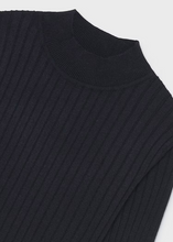 Load image into Gallery viewer, Girls Mock Neck Sweater in Midnight — a timeless ribbed essential designed to layer and transition seamlessly through every season. The clean mock neck silhouette works beautifully on its own or paired underneath the Girls Swing Back Sweater Vest for added depth and warmth. Crafted by Mayoral with quality construction that holds its shape, this versatile piece becomes a go-to staple in any girl's everyday wardrobe.