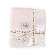 Load image into Gallery viewer, Softness and texture, everything your little snugglers are looking for! This sweet, cuddly blanket, with its nibble fur and satin binding, is perfect for cozy cuddles and comforting moments. Your little one will love snuggling up with this blanket, feeling the gentle touch of the softest fur and the silky satin. Whether it’s bedtime, movie night or just a quiet moment, this blanket is sure to bring comfort and joy. Let the snuggles begin!