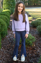 Load image into Gallery viewer, The Adele Split Flare Legging in Navy offers tween girls a perfect blend of comfort and style. Crafted from soft, stretchy fabric, these leggings provide all-day ease, while the unique split flare leg adds a trendy twist to any outfit. Ideal for active days or casual wear, they effortlessly elevate her wardrobe with a fashionable edge.