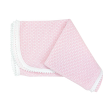 Load image into Gallery viewer, Wrap your newborn in timeless elegance with this Pom Pom Trim Receiving Blanket by Paty. Crafted from soft classic knit fabric, this essential baby blanket features delicate white mini pom pom trim that adds a touch of charm to nursery moments. Available in pink or blue, it's the perfect blend of practicality and style. Ideal for swaddling, stroller outings, or photo sessions, this blanket transforms everyday baby care into something beautifully memorable. A sophisticated choice for new parents who apprecia