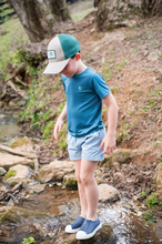 Load image into Gallery viewer, For your little angler, this PRODOH Boys' Pro Performance Short Sleeve T-shirt in Tapestry Blue with Fishing Lures will be your little bait and tackle expert's go to tee!
Sun-Safe Play-UPF 50+ protection shields sensitive skin during outdoor fun
90% Polyester 10% Lycra Moisture-wicking, quick-dry fabric that keeps them dry from backyard to bleachers