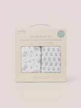 Load image into Gallery viewer, The Swaddle Blanket Set from JuJuBe × Studio Oh! includes two blankets, each with an irresistible, on-trend design. While perfect for swaddling newborns, these blankets can also be used for tummy time, as lightweight stroller covers, and as nursing throws. Each measures 44 by 44 inches (112 cm × 112 cm) and is made of sustainable, non-GMO bamboo fabric that is gentle on Baby’s skin and is soft, cozy, and breathable. Designed with sweet artwork in nursery-friendly colors, these blankets come packaged in a gi